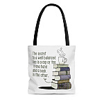 The Secret To a Well Balanced Life Is A Cup Of Tea In One Hand and A Book In The Other All Over Print Tote Bag