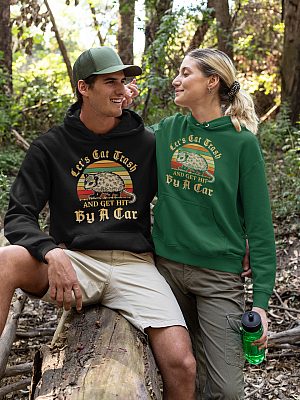 Let's Eat Trash & Get Hit By A Car Raccoon Saying Vintage Hoodie Sweatshirt - Funny Opossum Meme Retro Shirt-pullover-hoodie-mockup-of-a-couple-on-a-hike