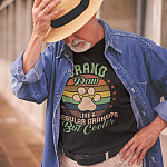 grand-paw-like-a-normal-grandpa-cooler-dog-lover-father's-day-shirt-stylish-white-senior-man-wearing-a-round-neck-tee-mockup-with-a-hat