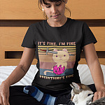 woman-wearing-a-t-shirt-mockup-petting-her-cat-on-bed-a18779