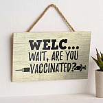 7TM ưu tiên. Welc Vaccinated - Door Sign Mockup 6