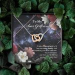 To My Sons Girlfriend It Takes A Special Girl To Fit Into Our Crazy Family Interlocking Hearts Pendant Necklace