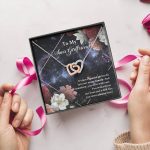 To My Sons Girlfriend It Takes A Special Girl To Fit Into Our Crazy Family Interlocking Hearts Pendant Necklace