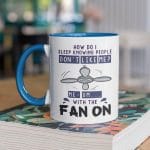 4O. Fan On-mockup-of-a-two-toned-11-oz-coffee-mug-mockup-on-a-table-27837 (1)