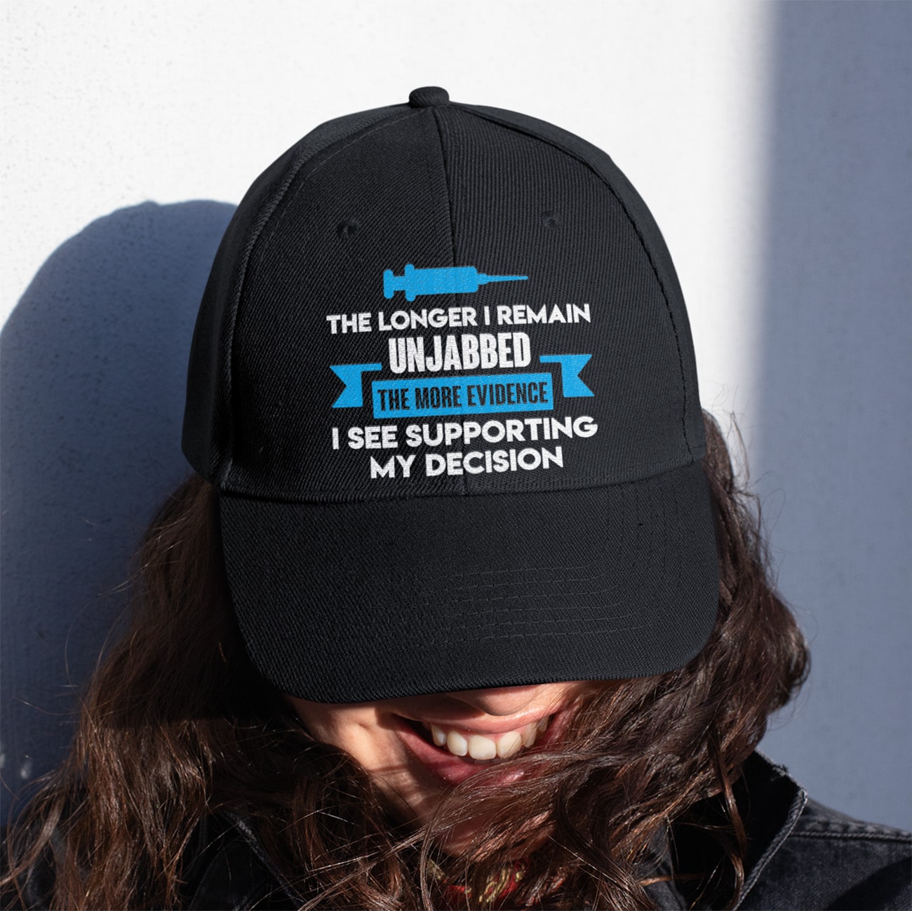 2O. Remain Unjabbed-dad-hat-mockup-of-a-woman-with-a-patched-denim-jacket-27033 (2)