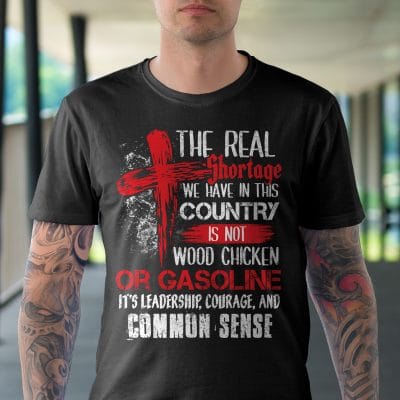 Alternative view of The Real Shortage We Have In This Country Is Not Wood Chicken Or Gasoline Jesus Cross T-Shirt