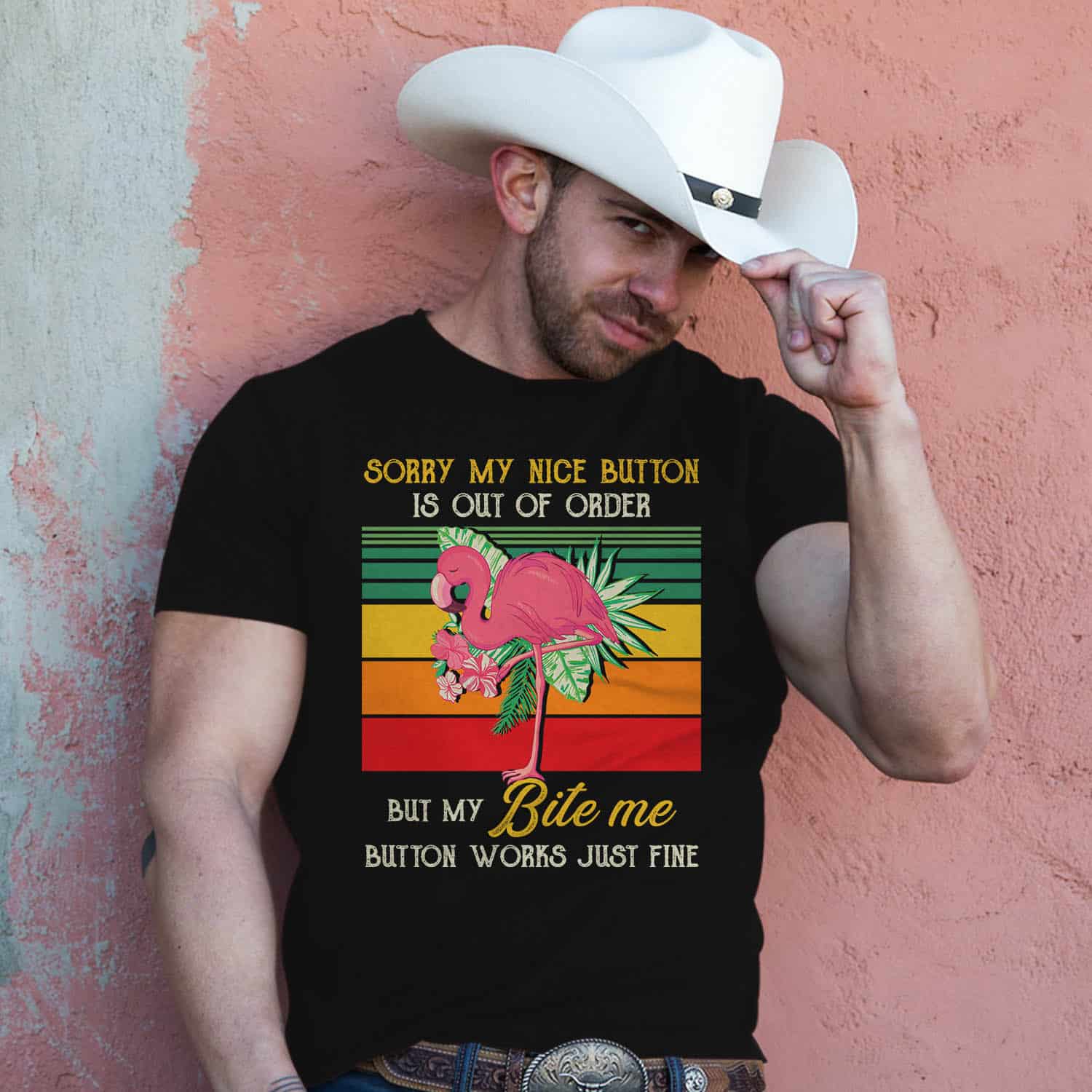 hot cowboy leaning on a wall