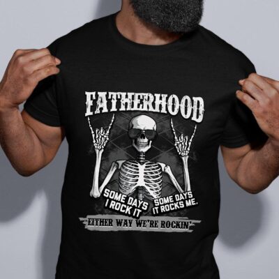 Fatherhood Some Days I Rock It Some Days It Rocks Me Funny Father's Day T-Shirt
